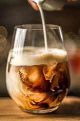 A coffee flavoured cocktail with ice cubes 
