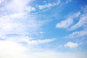 Fototapeta premium Blue sky background and white clouds soft focus, and copy space