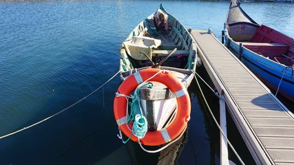 Obraz premium traditional painted moliceiro boats in the harbor