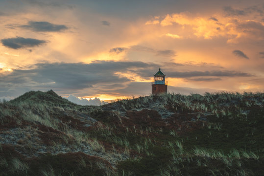Germany, Schleswig-Holstein, Sylt, Kampen, cross light in dunes at sunset