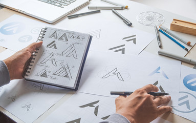 Graphic designer development process drawing sketch design creative Ideas draft Logo product...