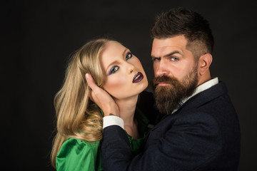 To love and to cherish. Couple in love. Bearded man hug woman with long hair. Intimate couple in fashion clothing. Fashion style and hair care. Style icons. They both love fashion