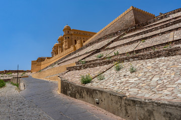 Beautiful view of Amber fort and Amber palace with its large ramparts and series of gates and cobbled paths, Constructed of red sandstone and marble. Located in Amer town Jaipur, Rajasthan, India