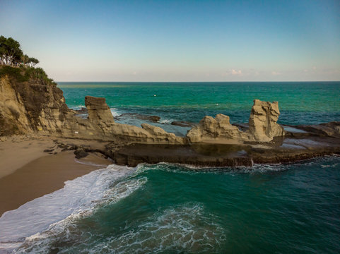 Aerial view of Klayar beach with rock tower, East Java, Indonesia