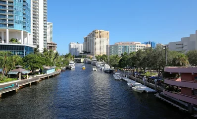 Foto auf Glas Skyline aerial view of downtown Fort Lauderdale   New River Waterways. Yachts and boats dock along the New River and next to Riverwalk a lush tropical riverfront park.  © Jillian Cain