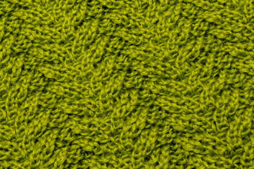 Green Gold olive wool threads in fabric knitted