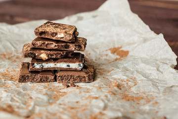 Dark chocolate bark with mixed fillingson wax paper