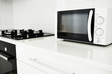 Fototapeta premium Modern kitchen interior with electric and microwave oven