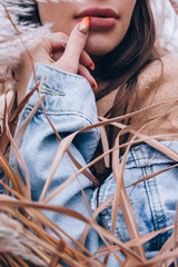 Portrait of a girl in high grass.