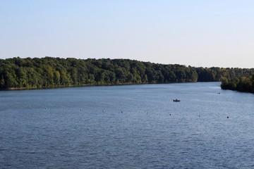A early morning look at the peaceful lake in the park.
