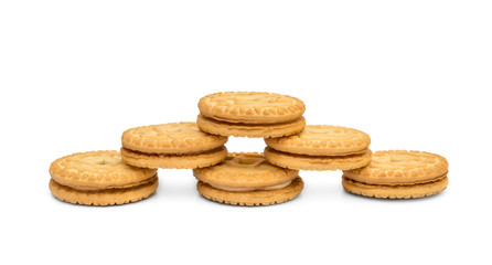 Pyramid from sandwich cookies on white.