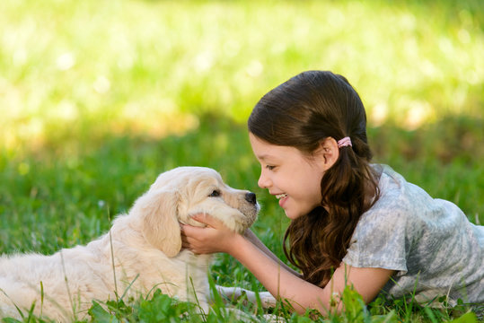 Girl playing with her pet