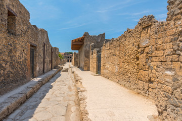 An ancient cobbled street in the ruins of Pompeii, Italy.