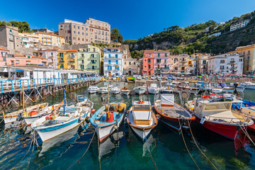 Small fishing boats at harbor Marina Grande in Sorrento, Campania, Amalfi Coast, Italy. - obrazy, fototapety, plakaty