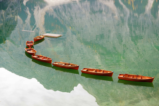 Lago di Braies. Lake Braies (Lago di Braies) in Dolomites Mountains. Boats on the Braies Lake ( Pragser Wildsee ) in Dolomites mountains, Sudtirol, Italy, Europe. Beautiful lake in the italian alps. 