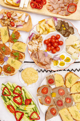 Table filled with traditional food from Romania and Moldova at a brunch