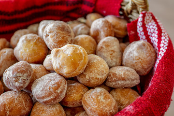 Traditional romanian doughnuts in a basket