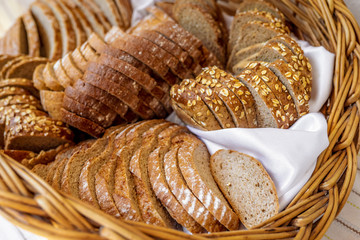 Fresh baked bread with seeds in a basket