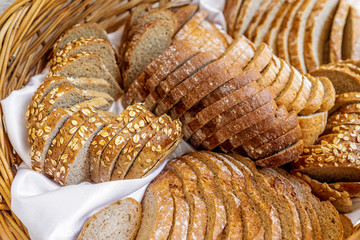 Fresh baked bread with seeds in a basket