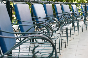 metal chair & leather cushion on terrace patio