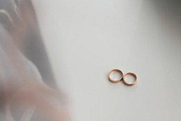 bride and groom holding hands