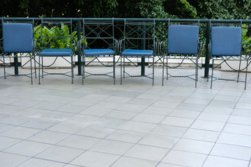 metal chair & leather cushion on terrace patio