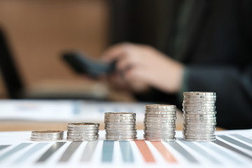 coins stack & business growth. businessman working
