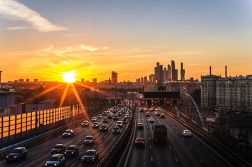 Highway traffic at sunset in Moscow