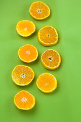 top view citrus slices flat lay green backgroun