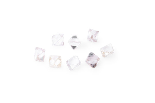 natural transparent diamonds in macro on a white background