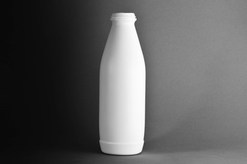 White plastic bottle - light and shadow