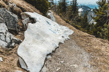Bench swallowed by snow on the Hochfelln