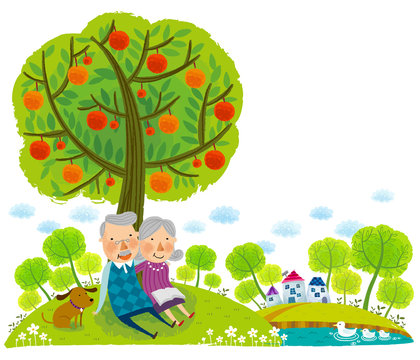 Elderly Couple Sitting Under Tree 