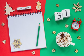 calendar December 31st cup cocoa and marshmallow, empty open notepad