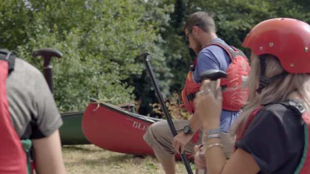 Preparing for a canoeing adventure