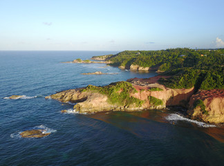 Obraz premium Red Rock at sunset, Calibishie, Dominica