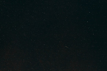 Night Starry Sky. Glowing Stars And Meteoric Track Trail In Dark