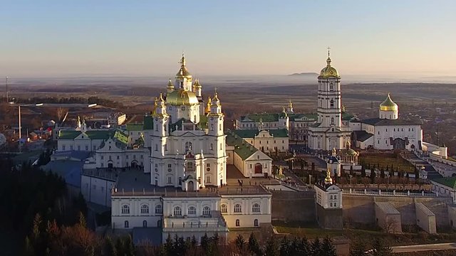 Aerial Pochaev Monastery, Orthodox Church in Ukraine, Pochayiv Lavra at the morning, Aerial view of church at dawn