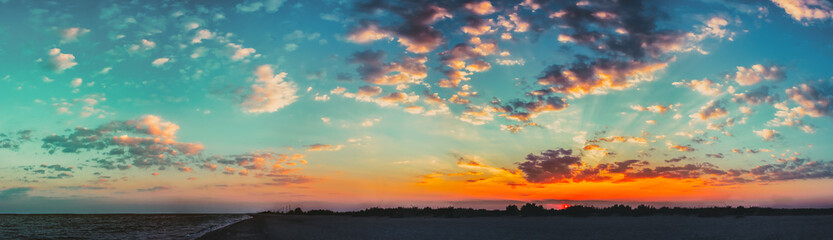 Sun Shining On Horizon During Sunset Sunrise. Panorama Of Sea Oc