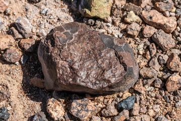 Chondrite Meteorite L Type, a piece of rock formed in outer space in the early stages of Solar System as asteroids. This meteorite comes from a meteorite fall impacting the Earth at Atacama Desert  © abriendomundo