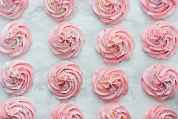 Homemade pink meringue as a background