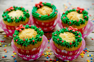 Christmas wreath cupcakes -  beautiful and delicious homemade cupcakes decorated with green cream and candy sprinkles, Christmas and New Year dessert