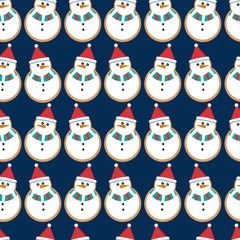 Vector seamless Christmas pattern with cookies in the shape of a snowman on a blue background.