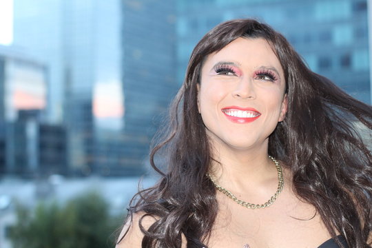 Young smiling man in drag