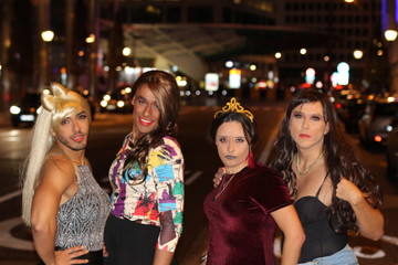 Group of cute LGBTQ+ people outdoors at night 