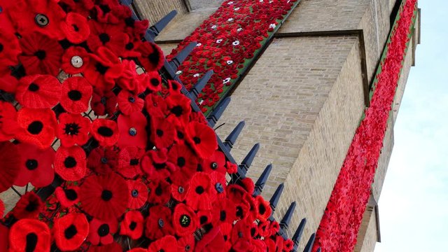 WW1 remembrance, Ypres, Belgium : thousands of knitted  poppies  cascading down the front of St Georges Memorial Church