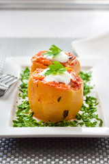 Zucchini stuffed with meat and vegetables