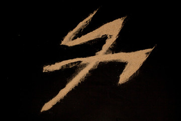 sand isolated on black background
