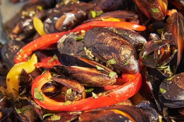 Boiled mussels with herbs and sweet pepper