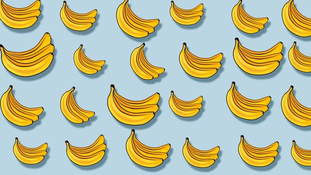 Colorful fruit pattern of fresh yellow bananas on light background. 4k video.